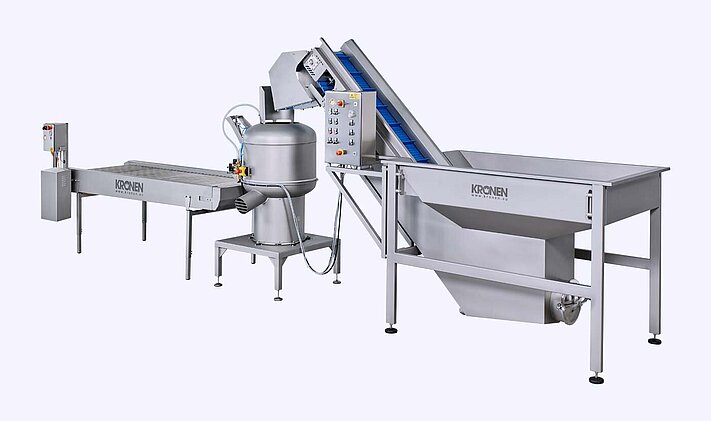 Le peleur à pommes de terre robuste PL 40K de KRONEN s’intègre idéalement dans les chaînes de production automatiques.