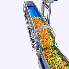 Le système de pesage de recettes du partenaire de KRONEN iWEIGH assure le remplissage continu et automatisé de la ligne de transformation