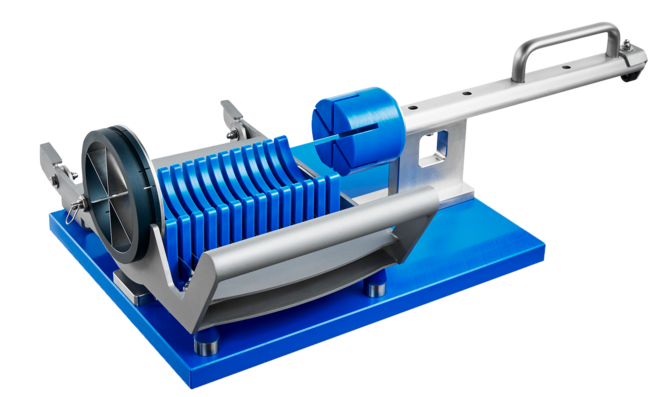 Manual pineapple chunk cutter MPC 100 from KRONEN for lightning-fast cutting of punched and cored pineapple cylinders into uniform pieces.