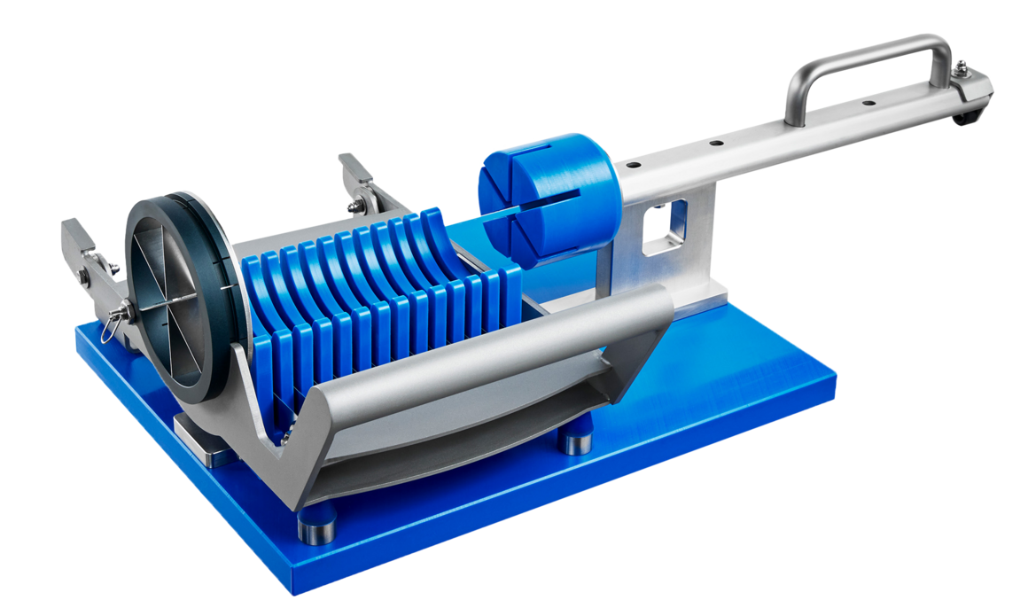 Manual pineapple chunk cutter MPC 100 from KRONEN for lightning-fast cutting of punched and cored pineapple cylinders into uniform pieces.