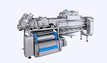 Lateral fine particle discharge on the HEWA KRONEN machine protects the pumps and makes continual work possible, even with products that foam and contain many small parts