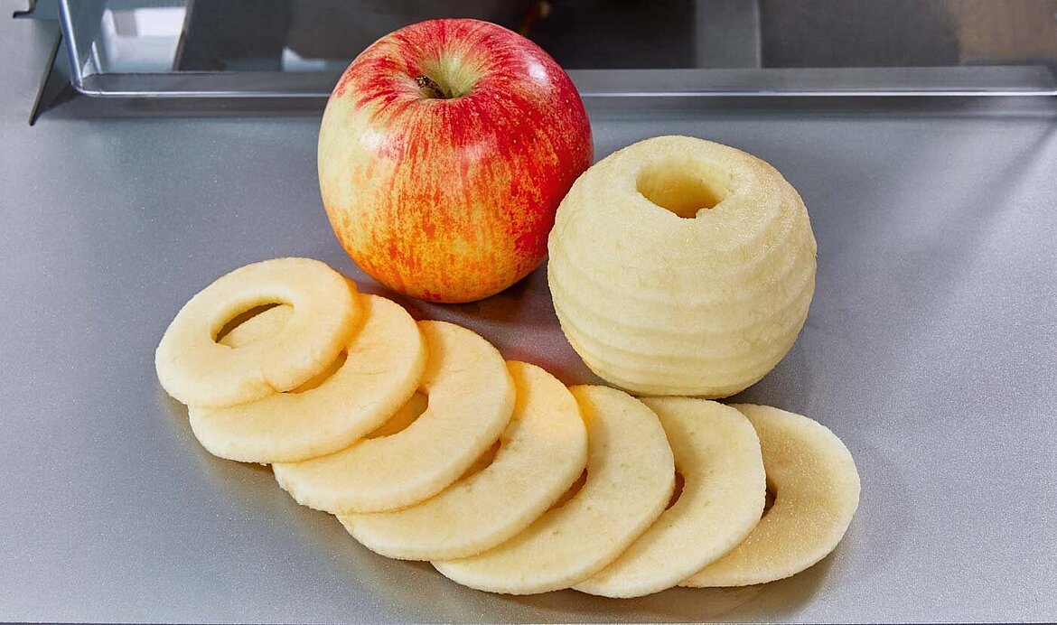 The peeling & cutting machine AS 6 from KRONEN has been perfected for the effective safe peeling, slicing or segmenting of apples