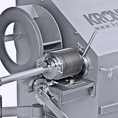 The cube, strip and slice cutting machine KUJ-V from KRONEN for vegetables, fruit and meat allows very easy  knife cylinder and blade changing
